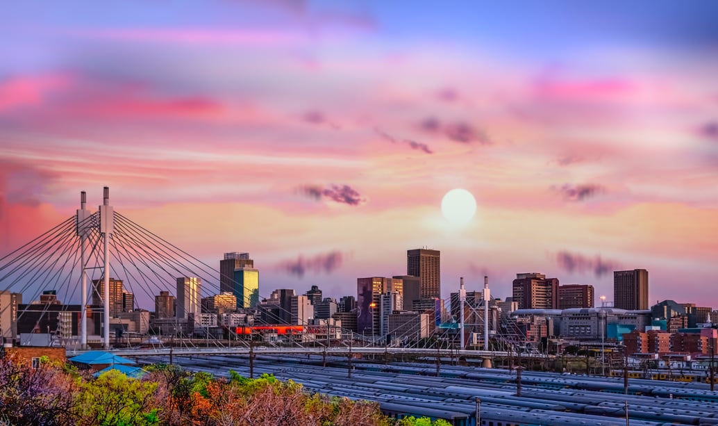 Johannesburg city skyline and Nelson Mandela bridge at sunset